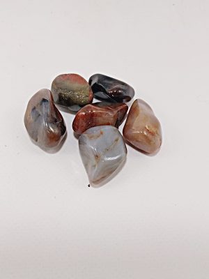 Canto rodado de madera petrificada natural tonos tierra 20 gramos macerox